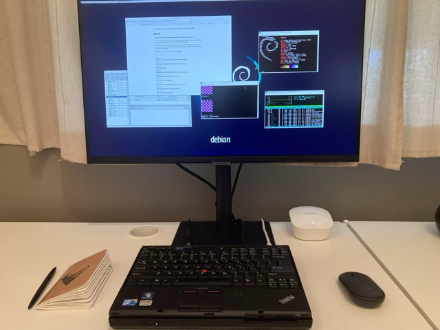 The X201 slabtop connected to my 4K monitor